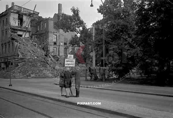 69th, infantry, division, Leipzig, Germany, 1945, June, Belgium, MPs, caught, tresspassing, must hold sign for one hour,