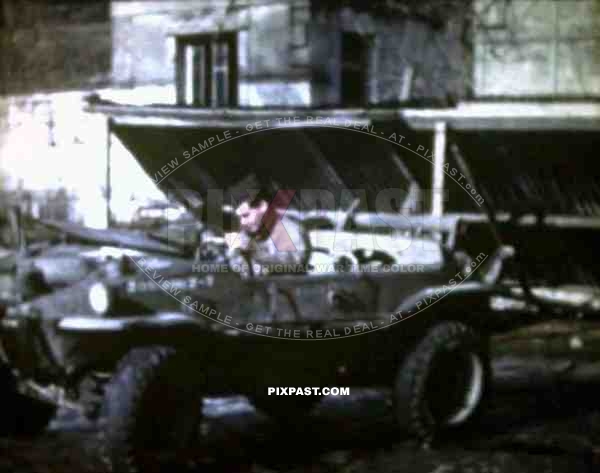 8mm home movie, France 1944, American GI soldier driving captured German Volkswagen Schwimmwagen Jeep.