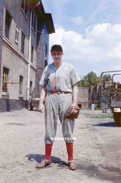 American GI soldier in full American Baseball uniform. Berlin army barracks. Germany 1946 OMGUS Team. Berlin League