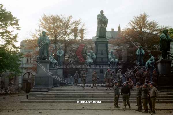 American GI soldiers resting beside Luther Monument  in Worms Germany 1945 Lutherdenkmal