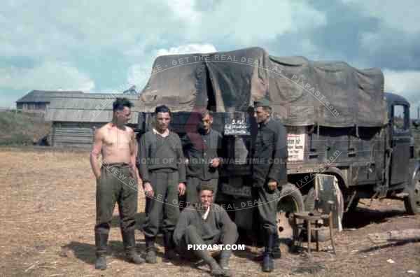 Army mechanics beside repair truck in Khislavichi, area Smolensk, Russia 1942,  10th Motorised infantry division