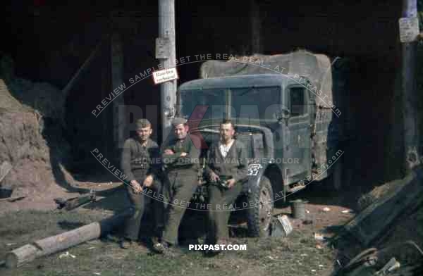 Army mechanics beside repair truck in Khislavichi, area Smolensk, Russia 1942, 10th Motorised infantry division