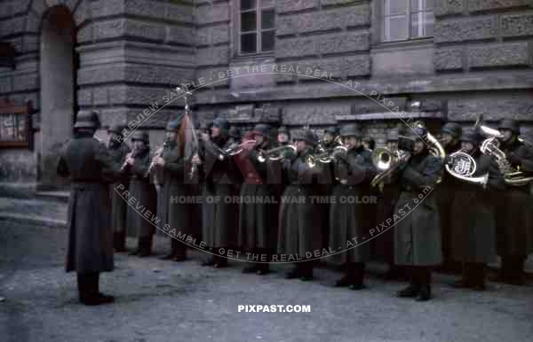 Berlin Germany 1944, Wehrmacht army music band playing music for city. Helmets and Music Instruments