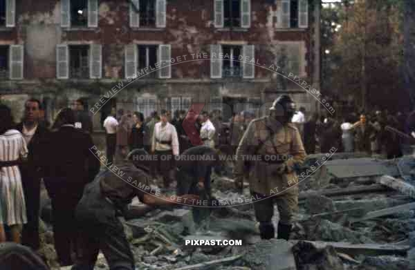 Bomb damage outside of Paris 1943, American aircraft day attack. French police and Luftwaffe soldiers. Palaiseau
