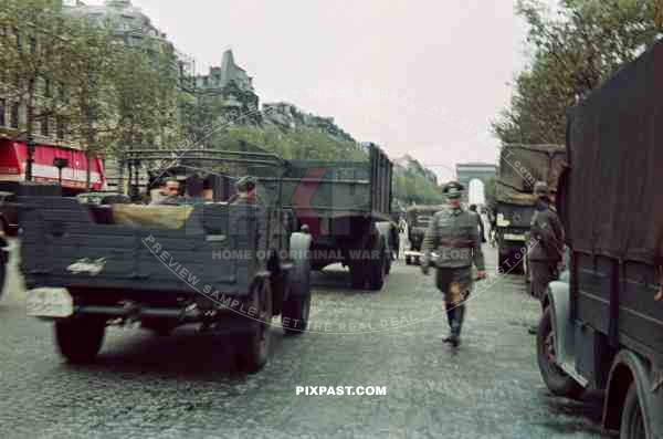 British Morris CS8 Supply truck of the 6. Infantry Division entering Paris France 1940. Champs Elysees
