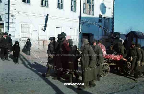Captured Russian army prisoners pull meat wagon, Ochtyrka, Ukraine, Winter 1941, 94. Infantry Division,