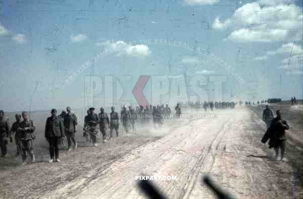 Captured Russian POW soldiers marching west.10th Motorised infantry division repair werkstatt Bryansk 1941