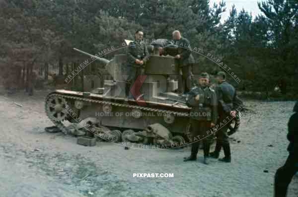 Captured Russian Soviet T-26 light infantry tank . Early pattern of idler wheel, so Manufactured in 1934. Russia 1941.