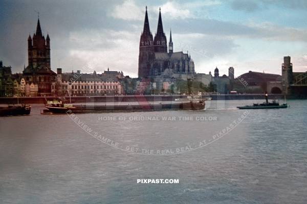 Cologne Cathedral in front of the Rhine River. Main train station to the right.