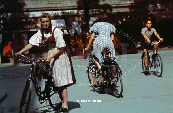 Cyclists in city centre of Stuttgart Germany 1939. 