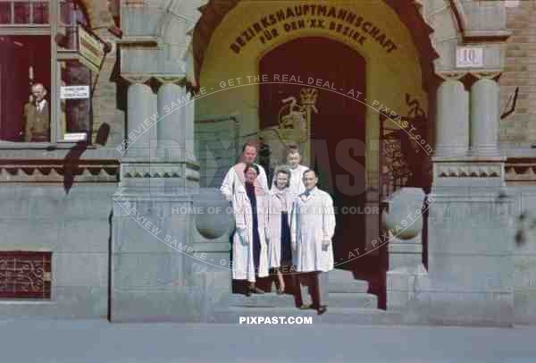 Doctors on the steps of the Bezirkshauptmannschaft Fur Den XX Bezirk Hospital. Brigittaplatz 10. Vienna Wien Austria 1941.