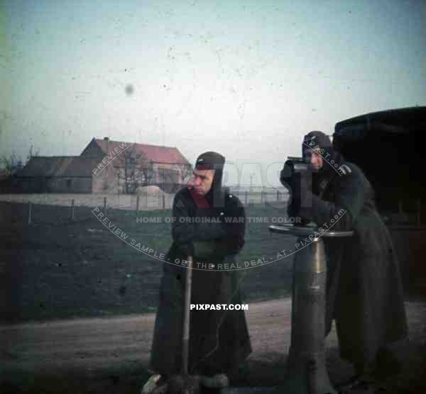 Dunkirk France winter 1940 Luftwaffe flak soldiers shovel aircraft viewer winter boots jacket