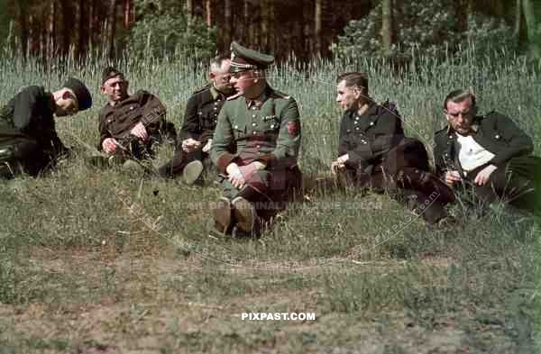 field police officer with his troops resting in forest 1939
