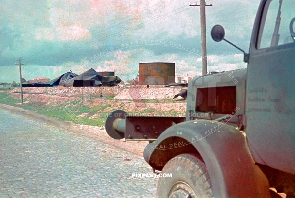 German army truck beside bombed oil storage tanks near Sea of Asov Ukraine 1942