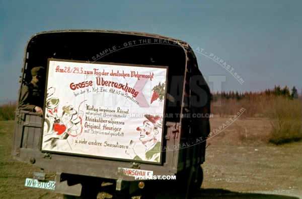 German army truck with advertisement poster for Tag der Deutsche Wehrmacht 1941 Ukraine. Kraft Ers. Abt 45 Spratzern