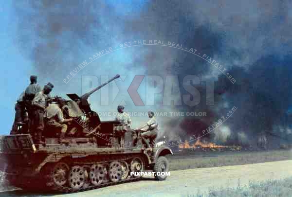 German Luftwaffe Half Track Sd. Kfz. 7/2 3.7cm Flak 36 attacking Russian army position, near Stalingrad 1942
