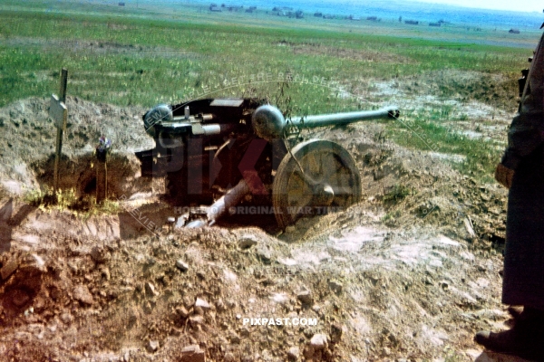 German PAK 40 artillery unit destroyed by Russian army. Used as war grave of German soldiers. Ukraine 1942.
