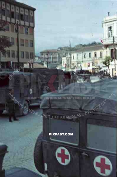German red cross medical ambulance trucks lorries captured Bedford British English Greece town 1942