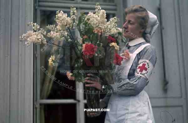 German red cross nurse DRK costume flowers Paris France 1940 hospital