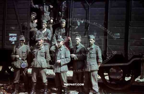 German soldiers in front of a train wagon, Sicherungsbataillon 738 in Kokorewka, Russia 1944