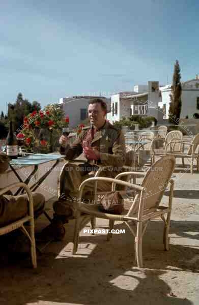 German War Photographer Fritz MoosmÃ¼ller drinks wine beside Leica III Camera,  Apartment Balcony, Karthago, Tunesien 1942