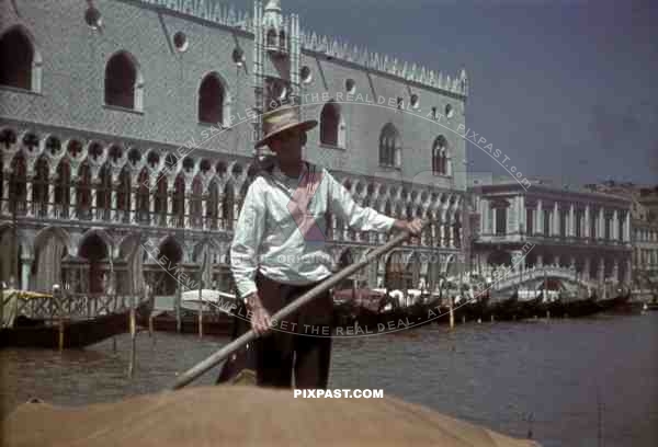 Gondolier on boat in Venice, Italy 1943