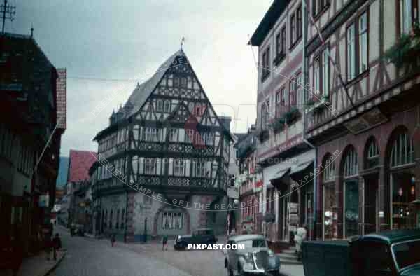 Heiliggieststrasse, Heidelberg Germany, 1937, August MÃ¼ssig, shops, old timers, vintage cars and trucks,