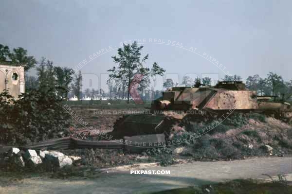 Knocked out German Stug Sturmgeschutz III tank with its barrel cut off. Tiergarten. Berlin June 1946.