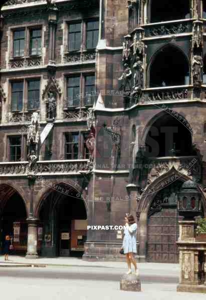 Little bear foot girl playing in front of New Town Hall. Neue Rathaus. Marienplatz. Munich Germany 1947