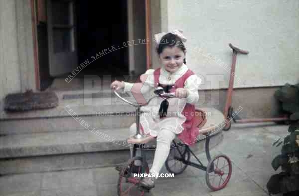 little girl on tricycle, Germany 1938