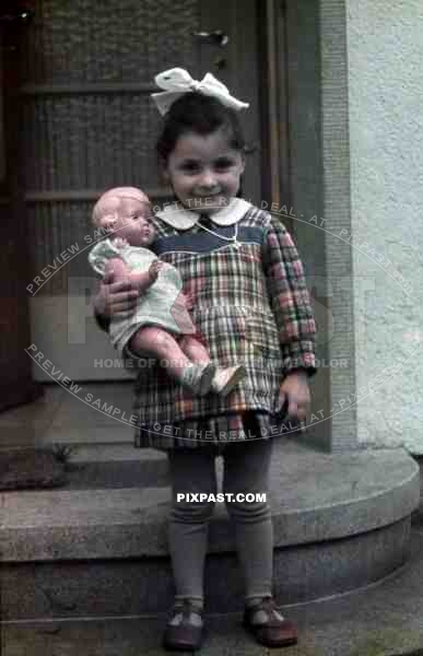 little girl with her doll, Germany 1938