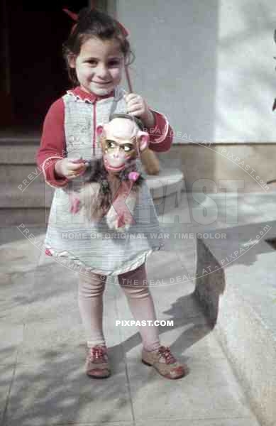 little girl with toy monkey, Germany 1938