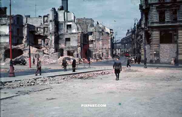Luftwaffe officer Bindewald in destroyed bombed city town Krakow Poland 1940. 