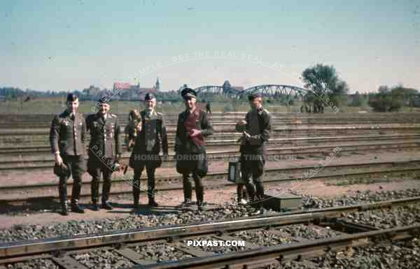 Luftwaffe officers in front of a railway yard in Thorn, Poland 1940