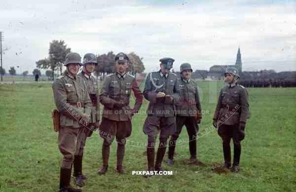 Officers in WW1 helmets inspecting infantry soldiers, Wendlingen, Germany, 1939. 14th Infantry Division.
