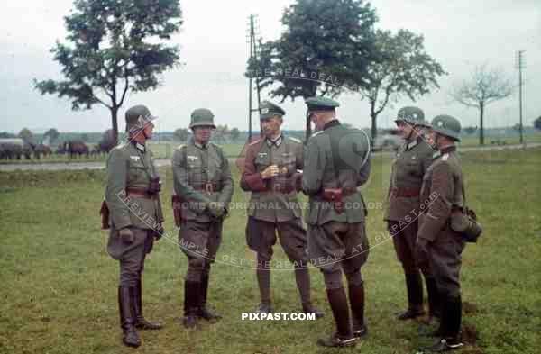 Officers in WW1 helmets inspecting infantry soldiers, Wendlingen, Germany, 1939. 14th Infantry Division.