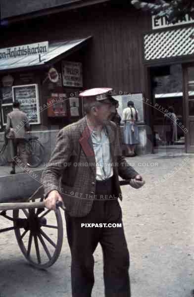 Old man pulling a cart in Mayrhofen, Austria 1941