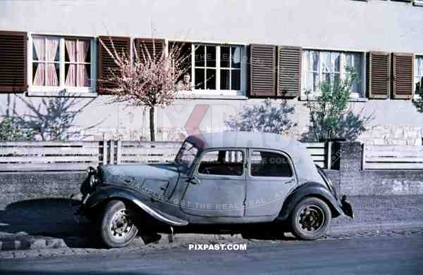 Pre- war captured Citroen Traction Avant 1938 car back in civilian usage in Munich, Germany 1946.