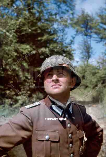 R.A.D. German War Reporter Kriegsberichter in South of France 1943. Wearing Camo Helmet with Chicken Wire.