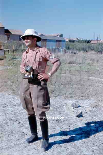 R.A.D. German War Reporter Kriegsberichter in South of France 1943. Wearing Tropical RAD helmet and Contax camera