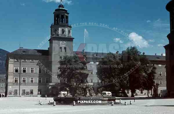 Residenzplatz, Salzburg, Austria, 1945, White Ambulance and Buses, fountain, clock tower, Museum, 
