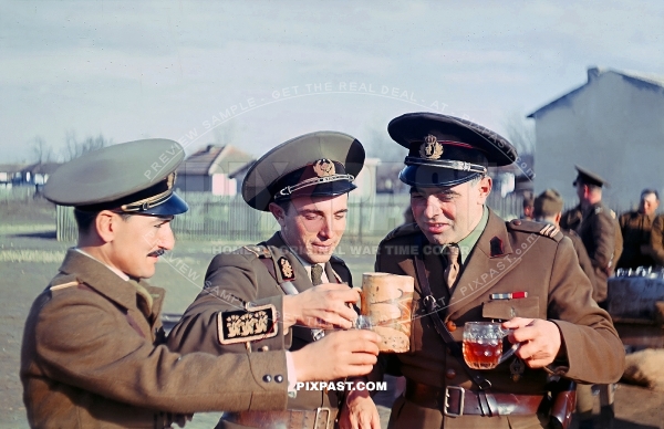 Romanian army officers drinking beer after training shooting practice. Romania 1943