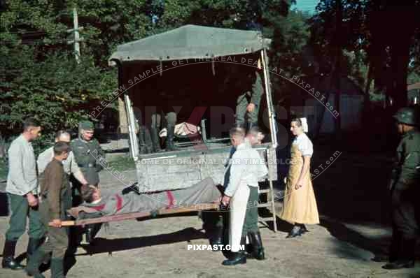 Russia german wehrmacht field hospital nurse doctor guard helmet truck lorry sick wounded 1941