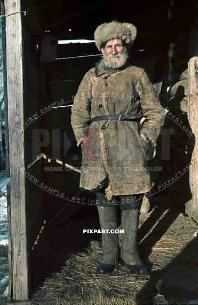 Russian peasant farmer portrait winter hat jacket cloths fashion Russian winter snow 1943 boots leather belt fur hat portrait