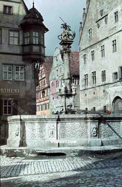 Saint GeorgeÂ´s fountain in Rothenburg ob der Tauber, Germany ~1938