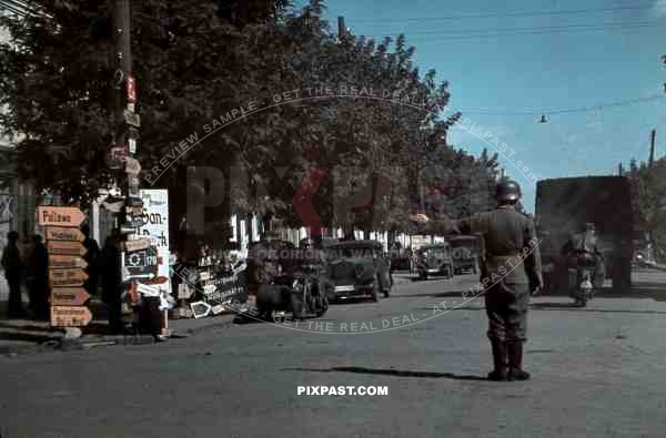 soldier controlling the traffic in Kramatorsk, Ukraine 1942
