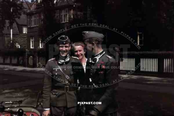 Two Wehrmacht soldiers say farewell to their mother in Hamburg, Germany ~1941