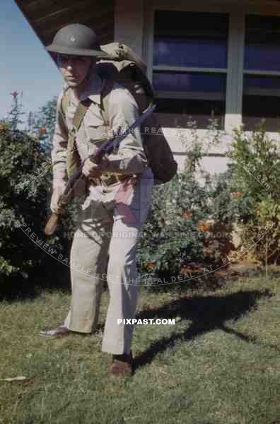 U.S. Army Infantryman in Florida USA 1942 wearing Brodie helmet and M1 Garand semi-automatic rifle with M1905 bayonet