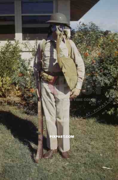 U.S. Army Infantryman in Florida USA 1942 wearing Brodie helmet, Gas Mask and M1 Garand semi-automatic rifle