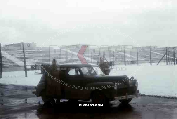 US officers with Sedan Ford Light 1941 Model Staff Car, Soldiers Field, US Army captured Nuremberg Rally field 1945.